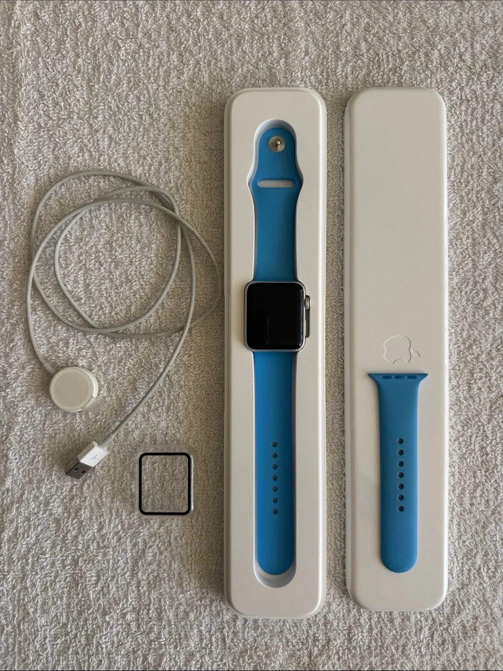 Apple Watch Series 3 with Bright Blue Sport Band Magnetic Charger and Case